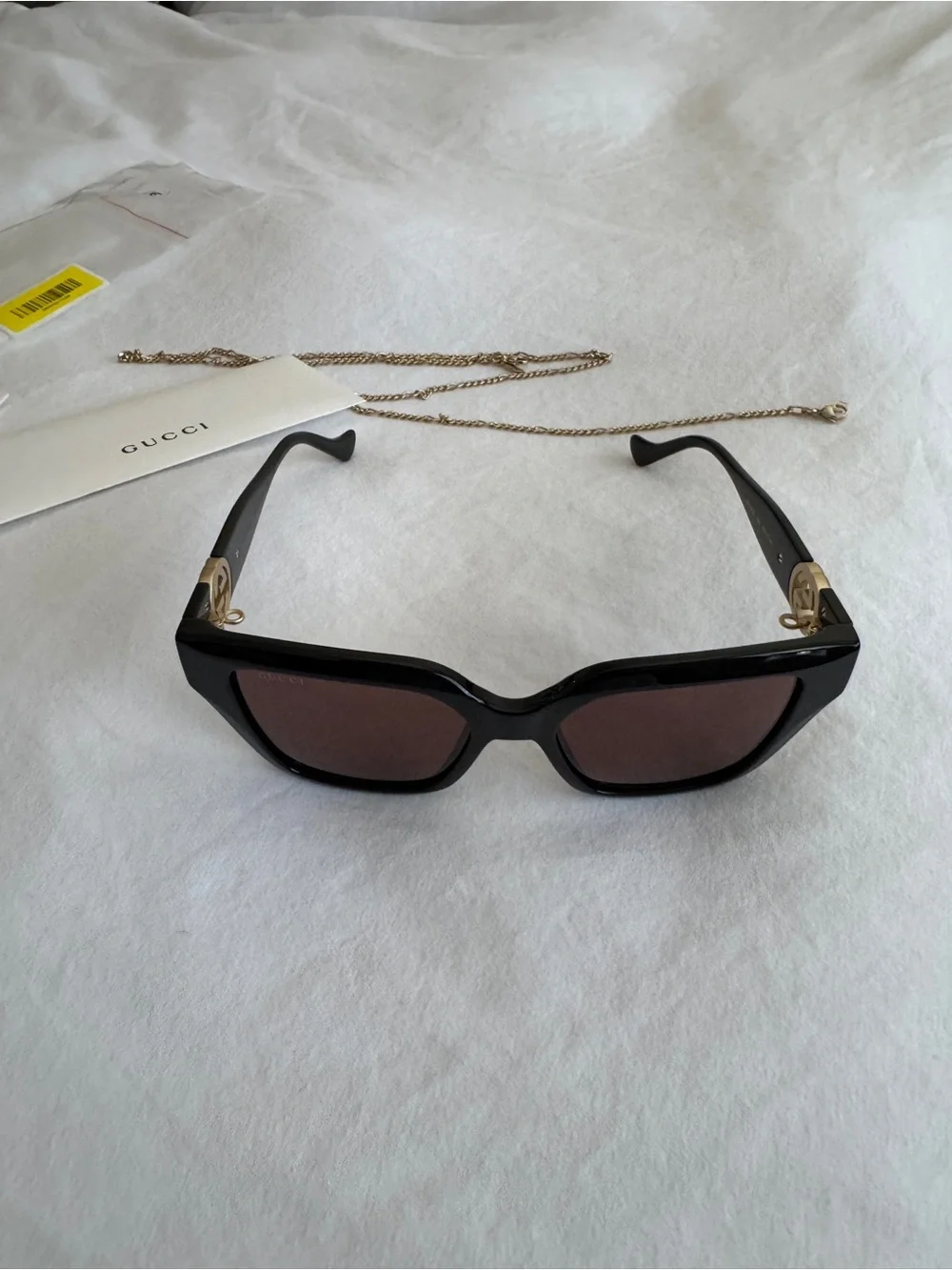 Gucci gold chain sunglasses with brown lenses